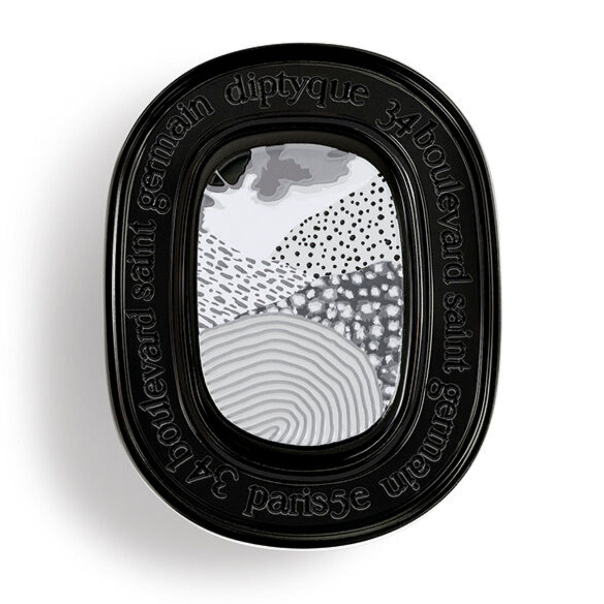 L'Eau Papier refillable solid perfume Diptyque.