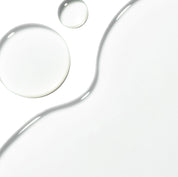 Swiss Perfection Exfoliating Solution – exfoliante líquido sin grano con AHAs y extracto de sauce para piel más lisa y luminosa.